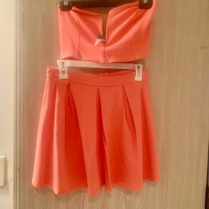 Pink/coral two piece strapless top and skirt - Size L stretch material